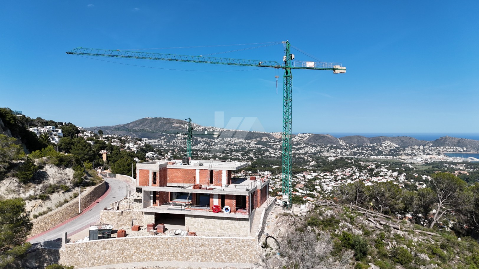 Luxe villa met zeezicht te koop in Moraira, Costa Blanca.